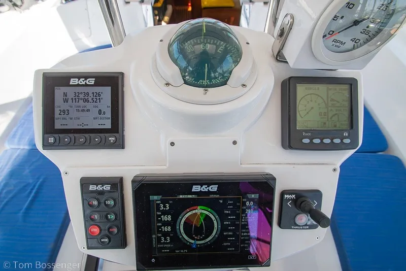 Slide: The Image of Navigation instruments on a 2009 Hunter 50 Center Cockpit sailboat dashboard. - 50