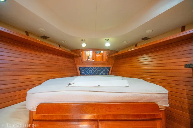Slide: The Image of Luxurious interior cabin of 2009 Hunter 50 Center Cockpit yacht with wooden paneling. - 27