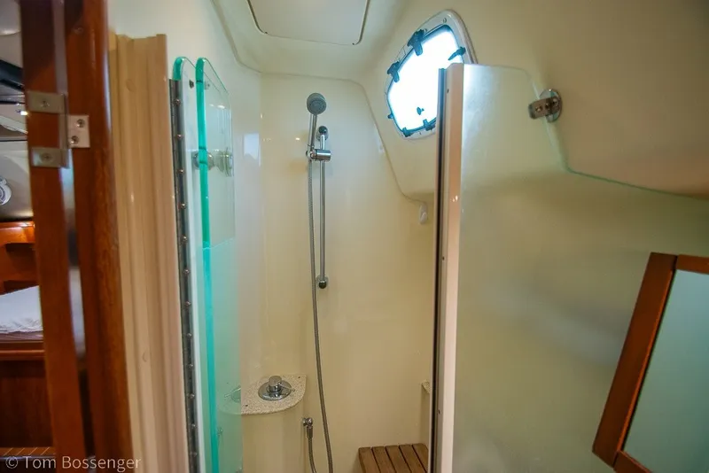 Slide: The Image of Shower area inside 2009 Hunter 50 Center Cockpit yacht, featuring modern fixtures and wooden accents. - 44