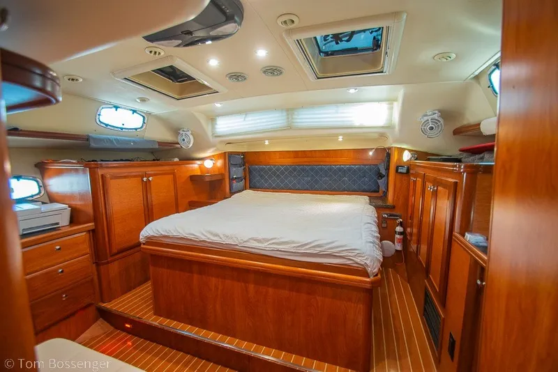Slide: The Image of Luxurious interior of 2009 Hunter 50 Center Cockpit yacht with wood finish and spacious bed. - 35