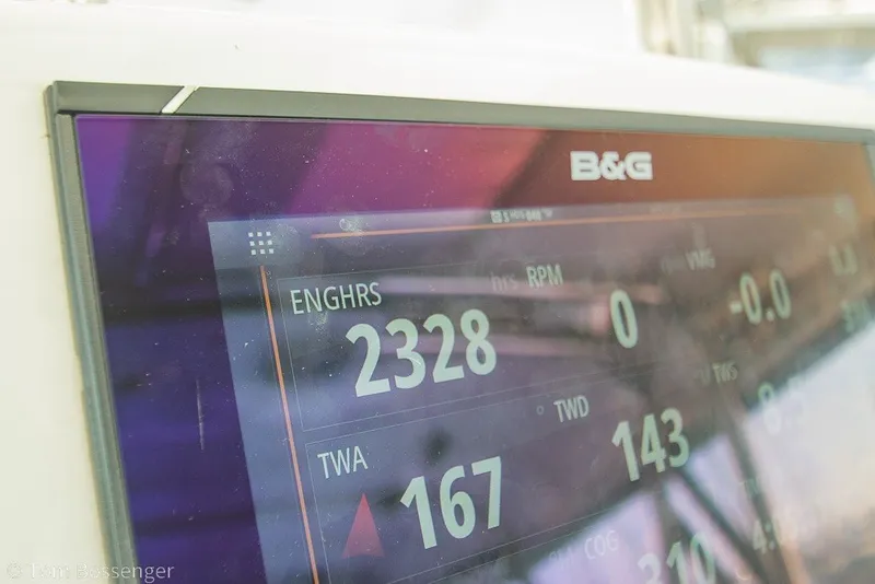 Slide: The Image of B&G marine display showing engine hours and wind data on a 2009 Hunter 50 Center Cockpit. - 88