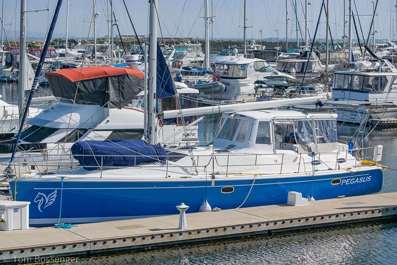 Slide: The Image of Hunter 50 Center Cockpit 2009 sailboat docked in a marina, named Pegasus. - 1