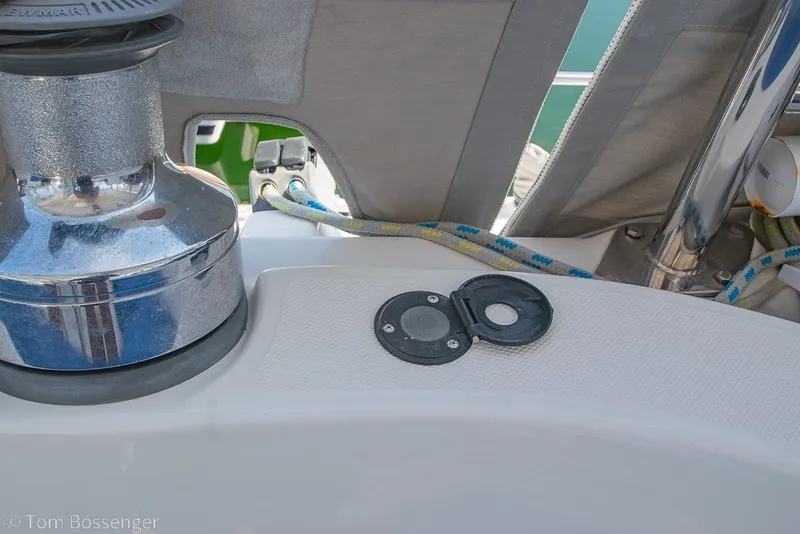 Slide: The Image of Deck detail of a 2009 Hunter 50 Center Cockpit sailboat with winch and rope. - 59
