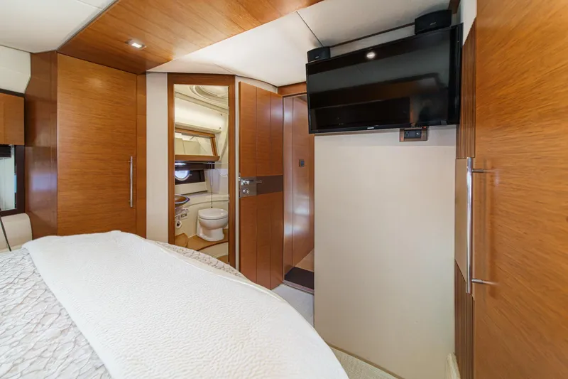 Slide: The Image of Luxurious interior of 2012 Azimut 48 yacht featuring bedroom and ensuite bathroom. - 39