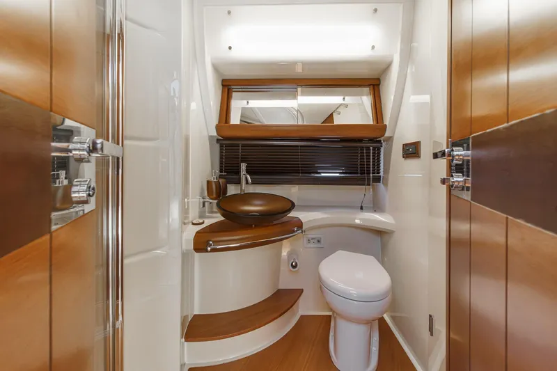 Slide: The Image of Luxurious bathroom interior of 2012 Azimut 48 yacht with modern fixtures and wooden accents. - 45
