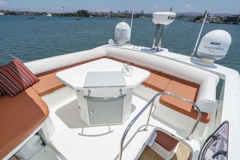 Slide: The Image of Luxurious 2012 Azimut 48 yacht deck with seating and navigation equipment on a sunny day. - 15