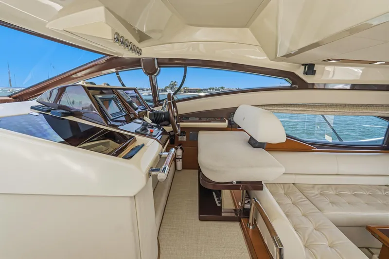 Slide: The Image of Luxurious interior of 2012 Azimut 48 yacht with modern helm and seating. - 29