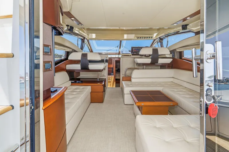 Slide: The Image of Luxurious interior of a 2012 Azimut 48 yacht with elegant seating and modern design. - 21
