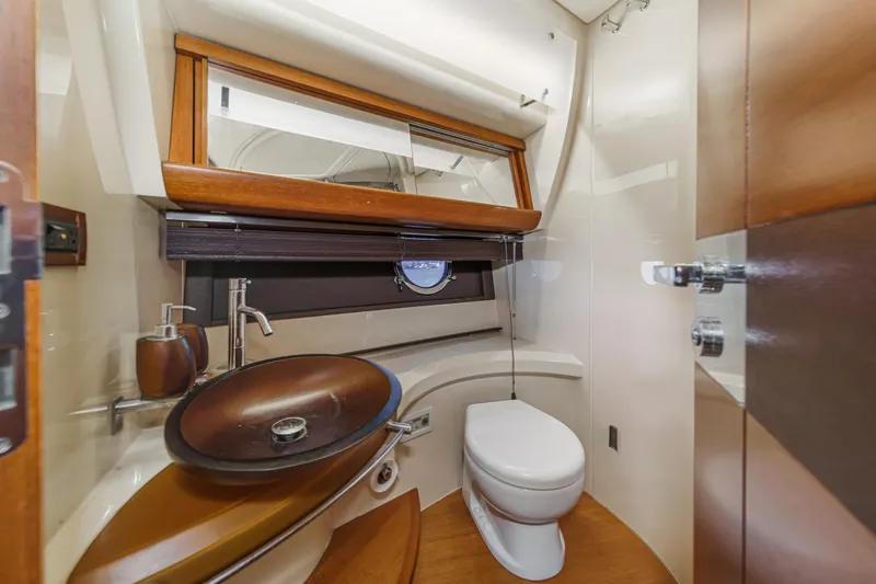 Slide: The Image of Luxurious bathroom interior of 2012 Azimut 48 yacht with modern fixtures and wooden accents. - 41