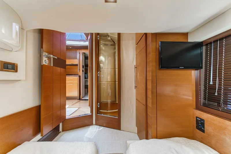 Slide: The Image of Luxurious interior of 2012 Azimut 48 yacht with wood finishes and modern amenities. - 44