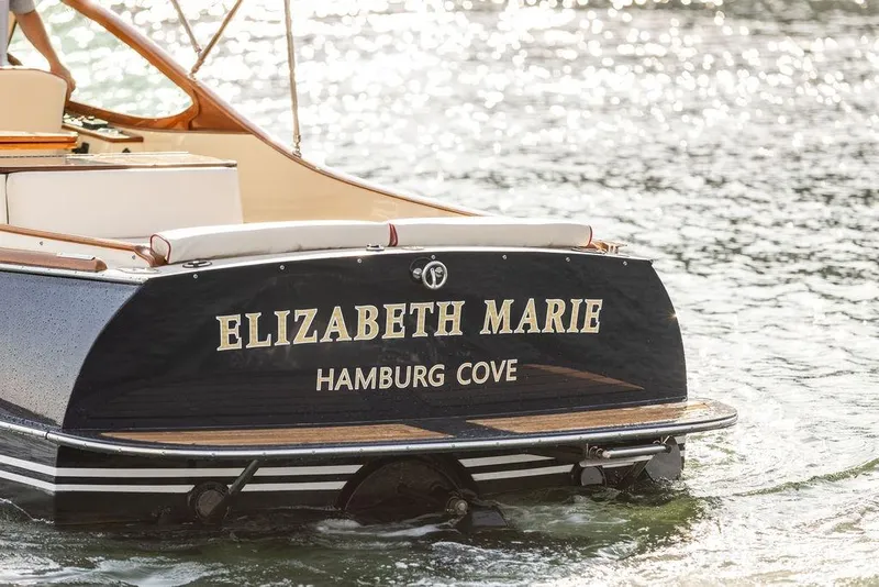 Slide: The Image of Hinckley Talaria 29R boat named "Elizabeth Marie" on water, 2008 model. - 43