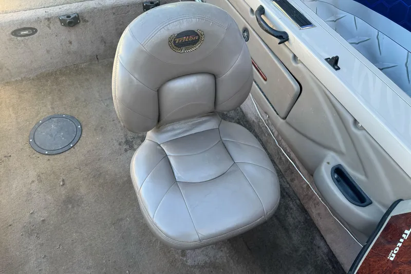 Slide: The Image of 2005 Triton DV 186 Mag boat seat, beige leather, interior view. - 13