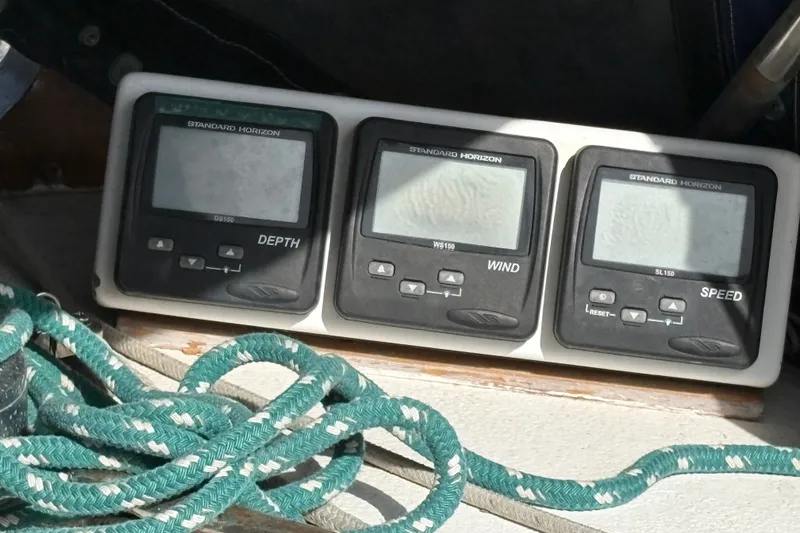 Slide: The Image of Standard Horizon marine instruments on 1977 Tayana 37 Cutter with green rope. - 8