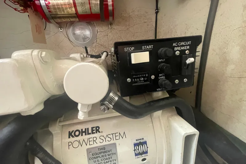 Slide: The Image of Kohler power system with control panel in 1999 Formula 31 Performance Cruiser. - 21