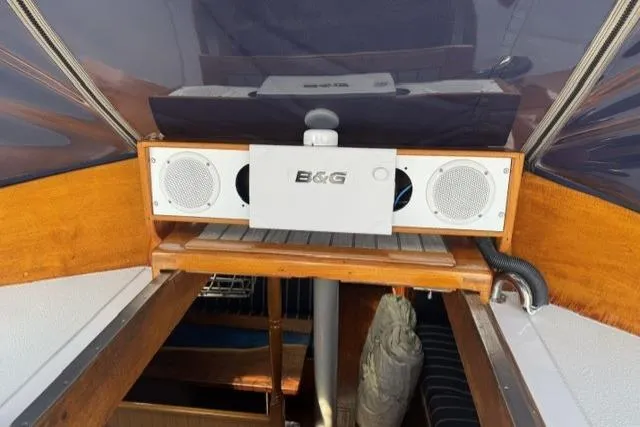 Slide: The Image of Interior view of a 1977 Kelly Peterson 44 sailboat with B&G speakers installed. - 11