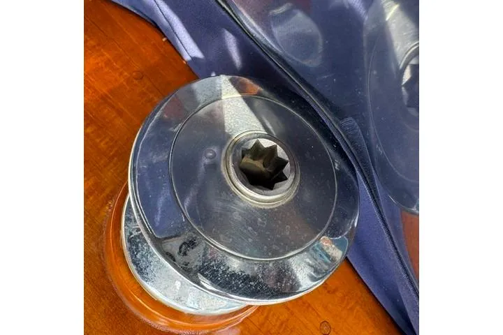 Slide: The Image of Close-up of a winch on a 1977 Kelly Peterson 44 sailboat deck. - 9