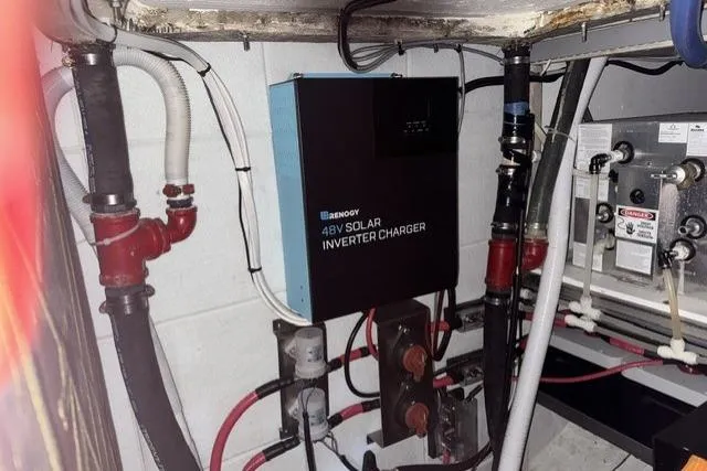 Slide: The Image of Electrical setup with Renogy 48V solar inverter charger on a 1977 Kelly Peterson 44 yacht. - 26