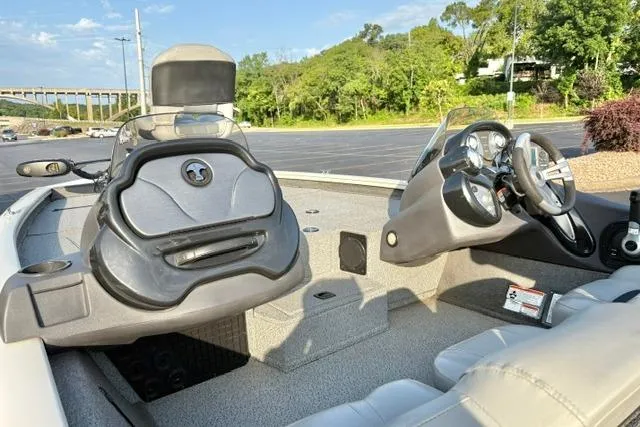 Slide: The Image of 2018 Tracker Pro Team 195 TXW 40th Anniversary Edition boat interior with steering console. - 40