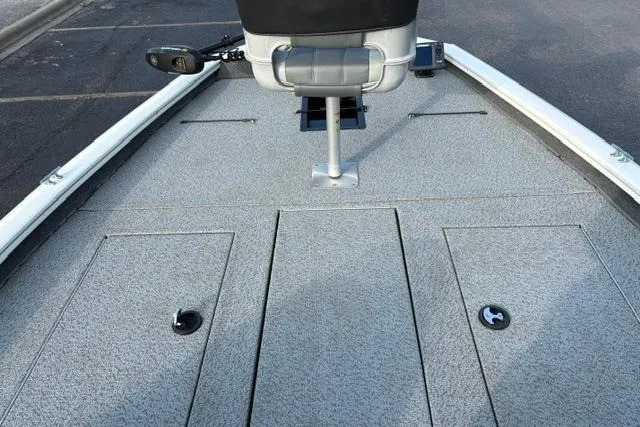 Slide: The Image of 2018 Tracker Pro Team 195 TXW boat deck with seating and storage compartments. - 21