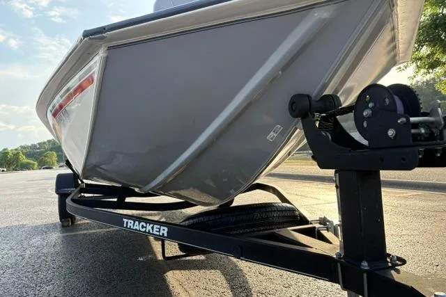Slide: The Image of 2018 Tracker Pro Team 195 TXW 40th Anniversary Edition boat on trailer, parked outdoors. - 9