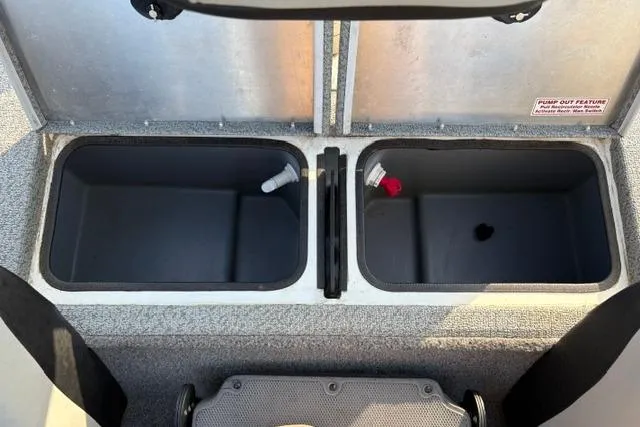 Slide: The Image of 2018 Tracker Pro Team 195 TXW boat storage compartments, open and empty. - 31