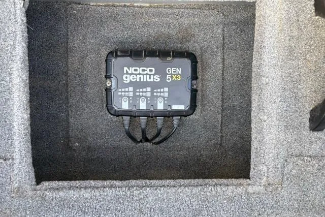 Slide: The Image of NOCO Genius GEN 5X3 charger installed in 2018 Tracker Pro Team 195 TXW boat. - 26