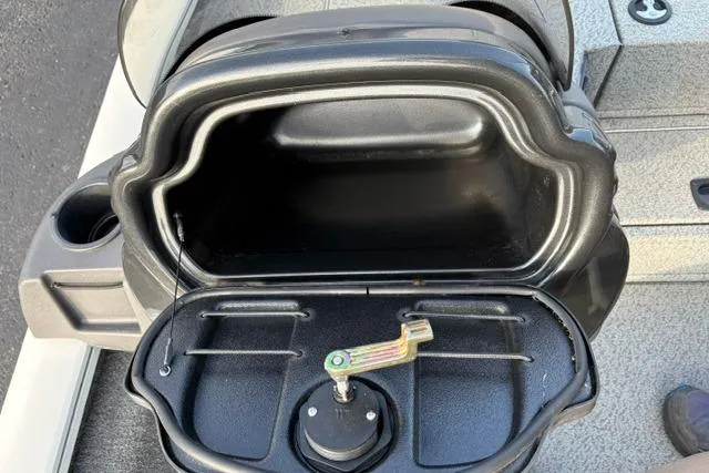 Slide: The Image of Open storage compartment on 2018 Tracker Pro Team 195 TXW 40th Anniversary Edition boat. - 19