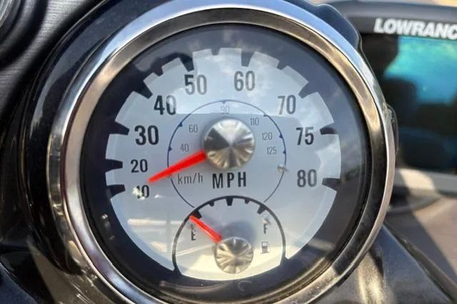 Slide: The Image of Speedometer and fuel gauge of 2018 Tracker Pro Team 195 TXW boat, showing speed in MPH. - 32