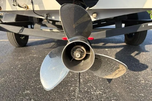 Slide: The Image of Propeller of 2018 Tracker Pro Team 195 TXW 40th Anniversary Edition boat on trailer. - 13