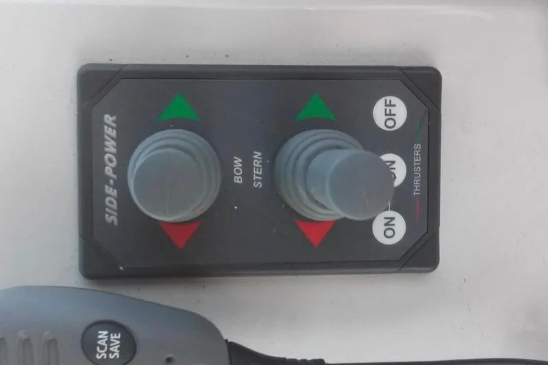 Slide: The Image of Control panel for thrusters on a 2012 Carver 41 Cockpit Motor Yacht. - 10
