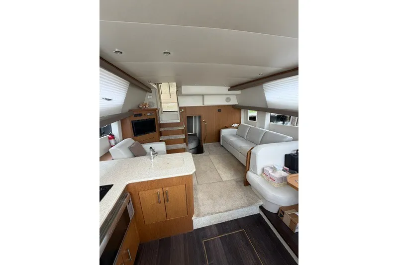 Slide: The Image of Luxurious interior of 2012 Carver 41 Cockpit Motor Yacht with modern furnishings. - 36