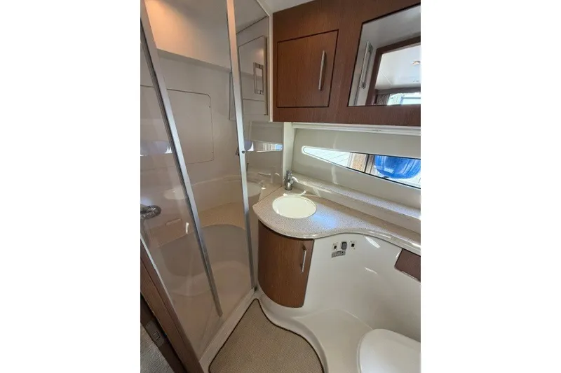 Slide: The Image of Luxurious bathroom in 2012 Carver 41 Cockpit Motor Yacht with modern fixtures. - 19