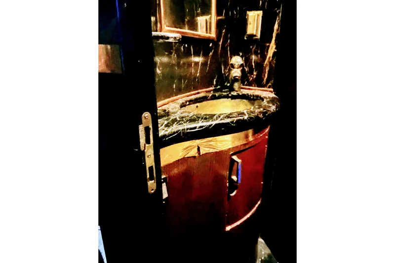 Slide: The Image of Luxurious bathroom sink with marble countertop on Sunseeker Camargue 50 yacht, 2000 model. - 28