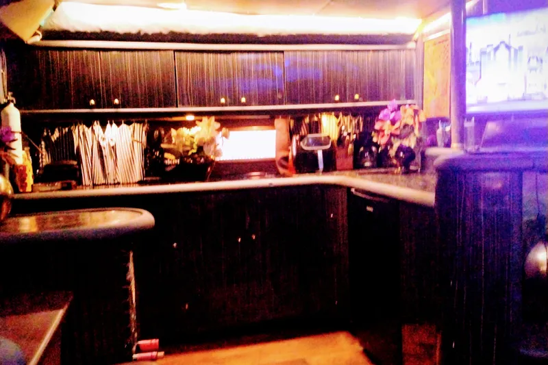 Slide: The Image of Luxurious interior of a 2000 Sunseeker Camargue 50 yacht with elegant cabinetry. - 25