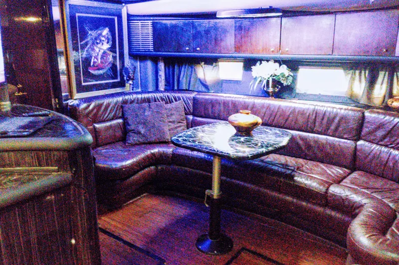 Slide: The Image of Luxurious interior of a 2000 Sunseeker Camargue 50 yacht with leather seating and elegant decor. - 19