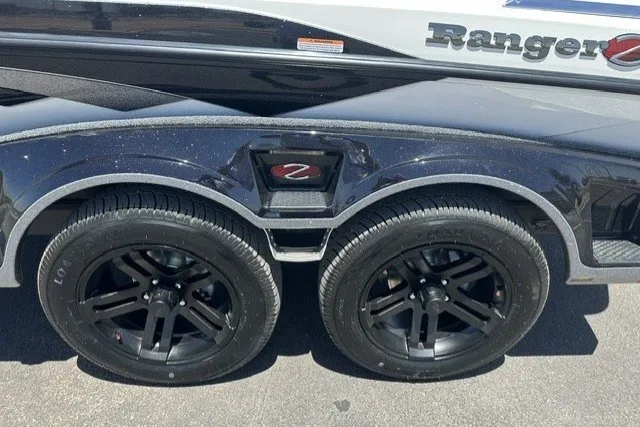 Slide: The Image of 2026 Ranger Z521R boat trailer with dual black wheels and sleek design. - 21