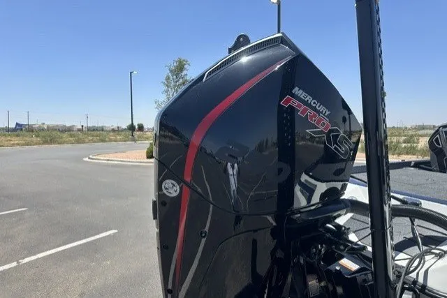 Slide: The Image of 2026 Ranger Z521R boat with Mercury Pro XS engine in a parking lot. - 5