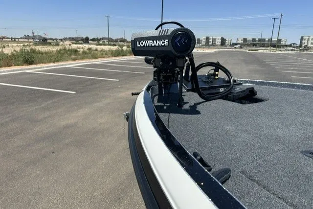 Slide: The Image of 2026 Ranger Z521R boat with Lowrance equipment in a parking lot. - 9
