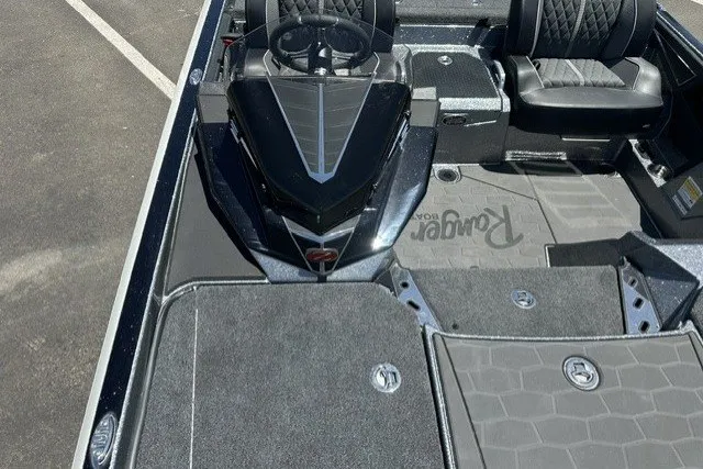 Slide: The Image of 2026 Ranger Z521R boat interior with sleek seating and modern design. - 14