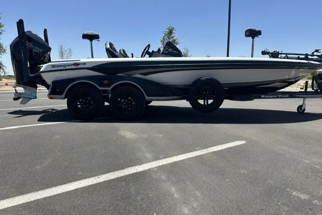 Slide: The Image of 2026 Ranger Z521R boat on trailer in parking lot, side view. - 2