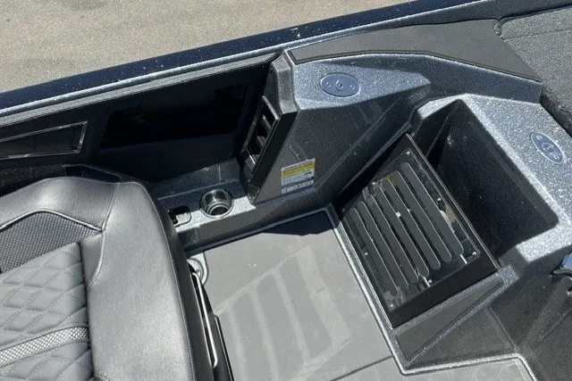 Slide: The Image of Interior of 2026 Ranger Z521R boat featuring sleek seating and storage compartments. - 12