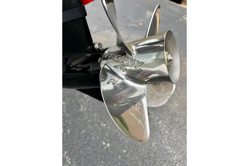 Slide: The Image of Close-up of a shiny boat propeller on a 2026 Mako Pro Skiff 15 CC. - 3