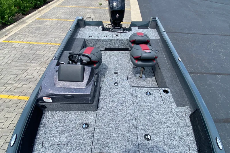 Slide: The Image of 2026 Ranger VS1782SC Angler boat interior with seating and steering console. - 6