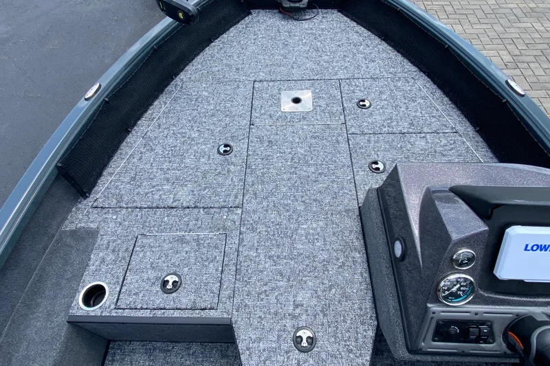 Slide: The Image of 2026 Ranger VS1782SC Angler boat deck with storage compartments and control panel. - 5