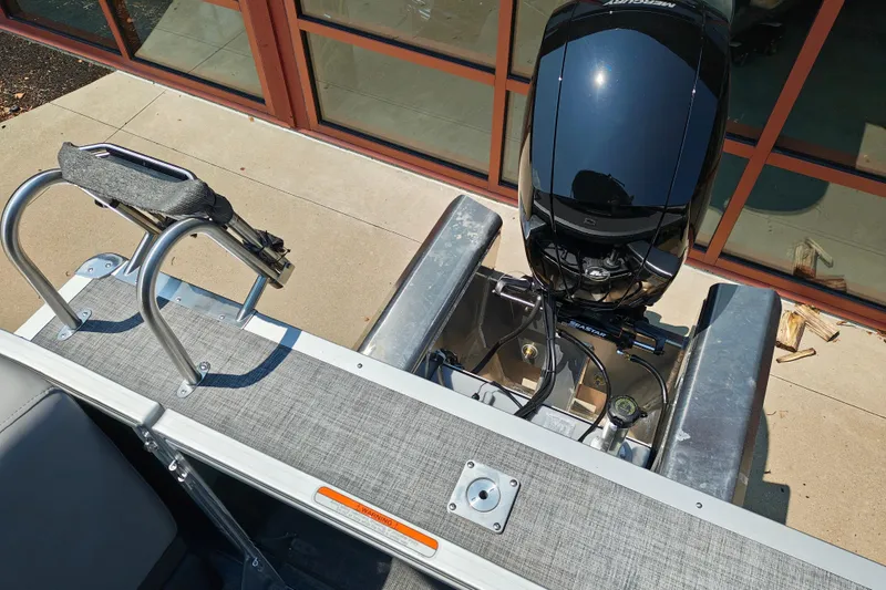 Slide: The Image of 2026 Sun Tracker Party Barge 24 XP3 with Mercury outboard motor and swim ladder. - 25