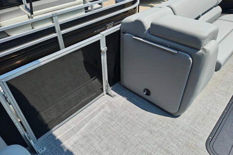 Slide: The Image of 2026 Sun Tracker Party Barge 24 XP3 interior with gray seating and flooring. - 15