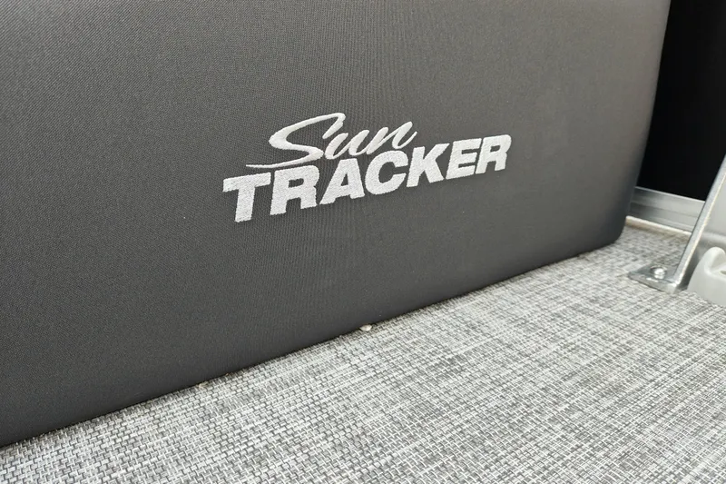 Slide: The Image of Sun Tracker Party Barge 24 XP3 2026 logo on boat seat upholstery. - 27