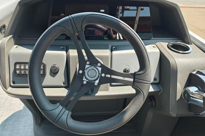 Slide: The Image of Steering wheel of 2026 Sun Tracker Party Barge 24 XP3 pontoon boat. - 20