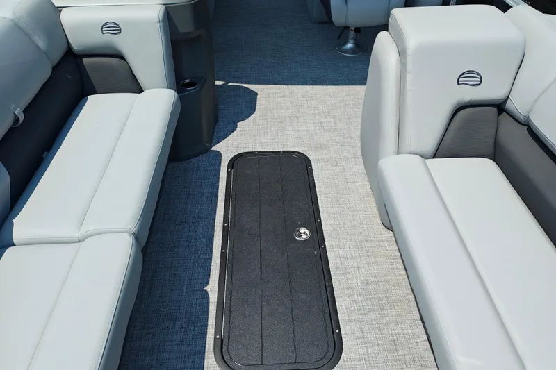 Slide: The Image of Interior of 2026 Sun Tracker Party Barge 24 XP3 with gray seating and flooring. - 12