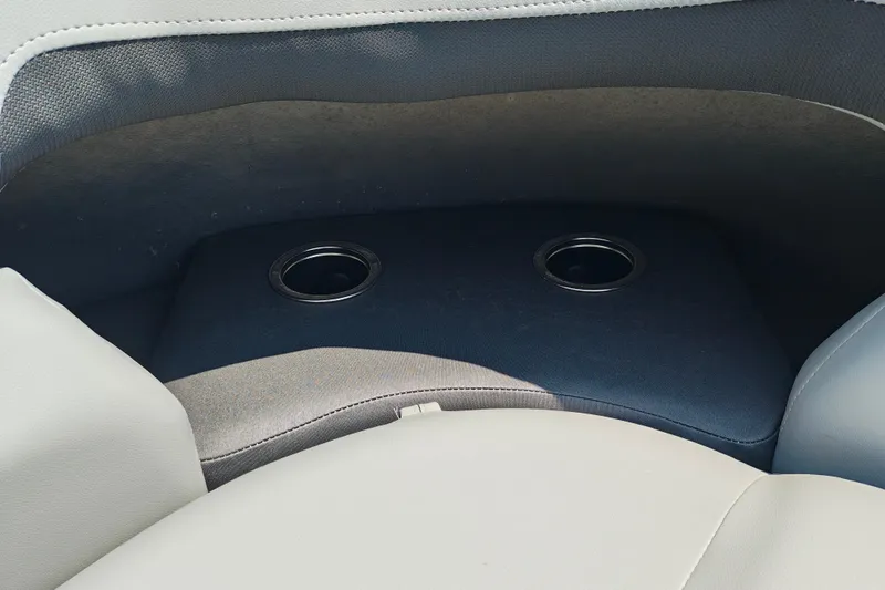 Slide: The Image of Cup holders on Sun Tracker Party Barge 24 XP3, 2026 model, with beige seating. - 9
